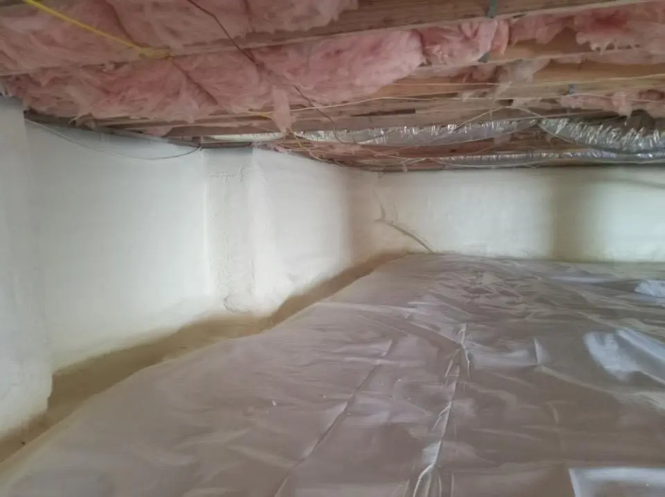 Crawl space encapsulation with closed-cell spray foam for Commercial Roof Restoration in Middle